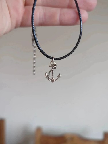 Tiny silver anchor - charm, on